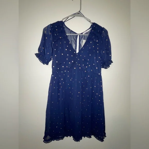 green emerald velvet dress Joules Blue Velvet Long Sleeve Dress with Gold Stars. Elastic Waist, Two Side Pockets and Two Star Buttons at Back. Size 3t main image 1